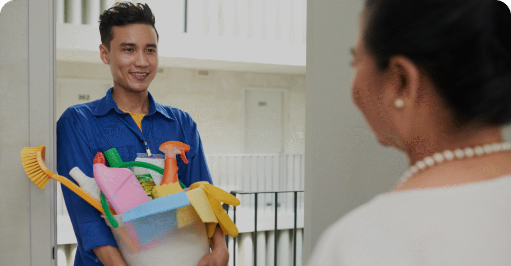 Cleaning professional carrying cleaning supplies for customised cleaning service